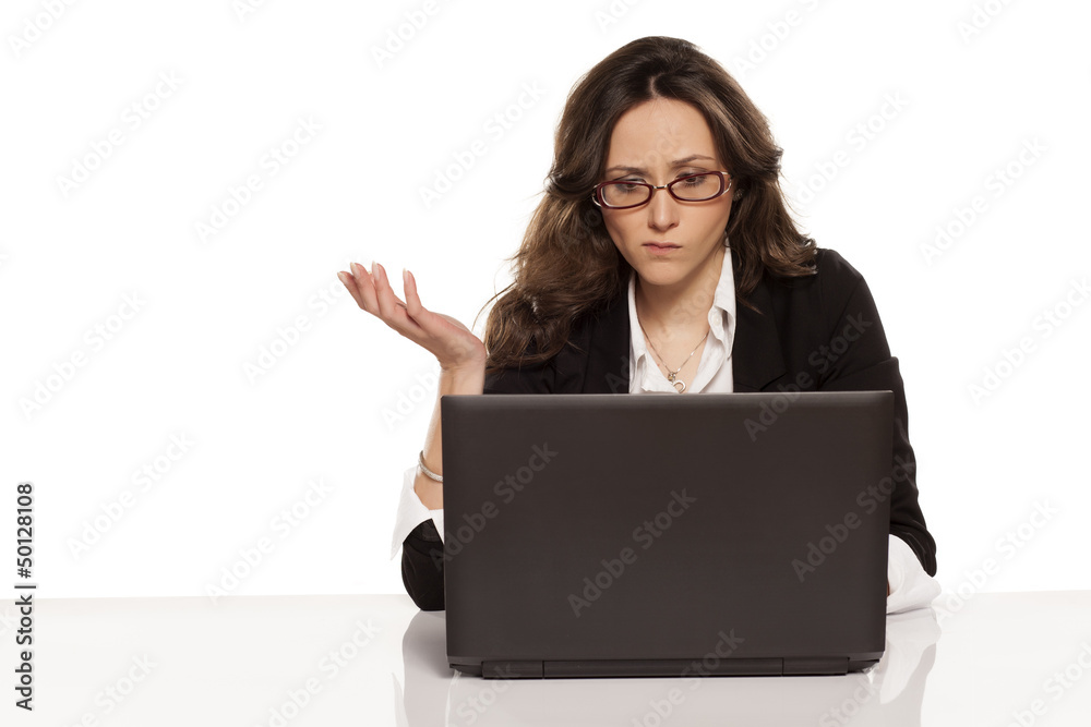 confused girl with a laptop and do not know what to do further confused girl with a laptop and do not know what to do further