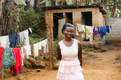 Young African woman in backyard photo