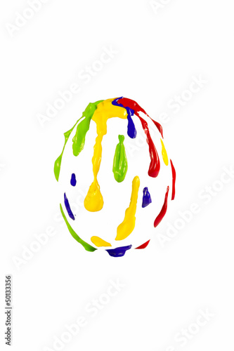 Multicolored paint shaped in form of egg