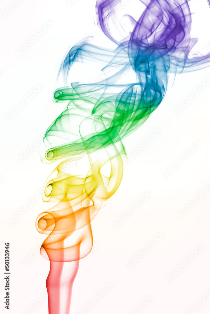 Rainbow colored swirling smoke pattern on white Rainbow colored swirling smoke pattern on white