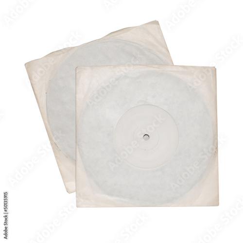 Two vinyl records in white sleeves