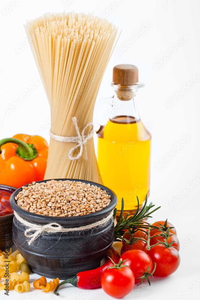 The composition of the pasta and vegetables on background The composition of the pasta and vegetables on background