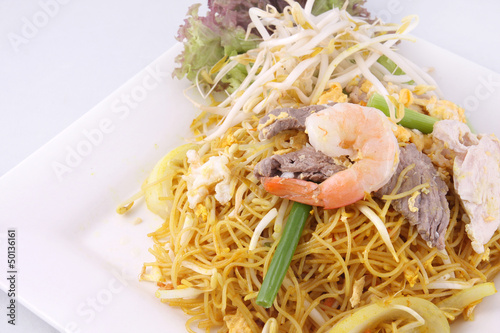 Photography Sigapore noodles stir fried with vermicelli noodles.