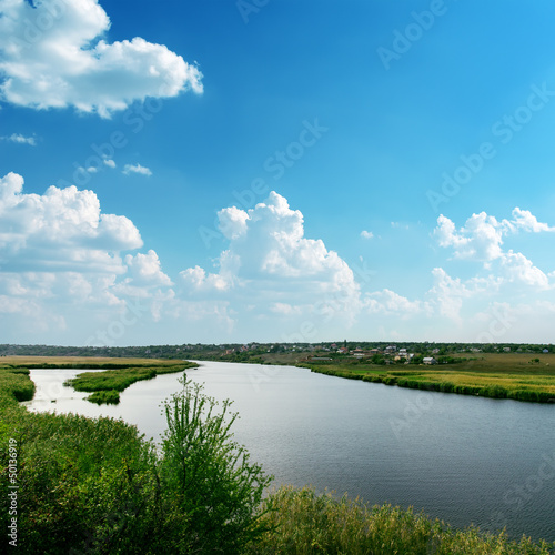 Tela big river and blue cloudy sky