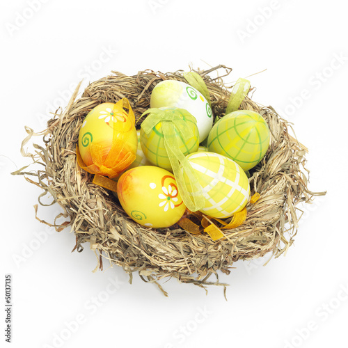 Decorated eggs for Easter in a nest