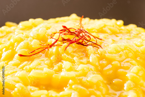 Tableau sur toile Risotto allo zafferano - Saffron rice, closeup