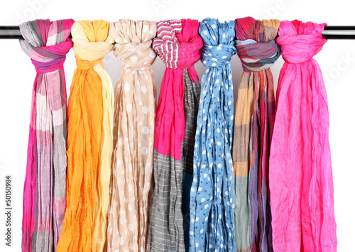 Many bright female scarfs isolated on white © Africa Studio
