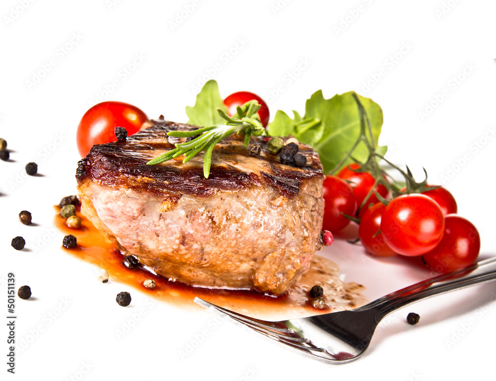 Beef steak medium grilled, isolated on white background