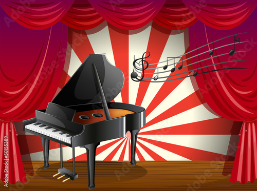 A piano at the stage with musical notes