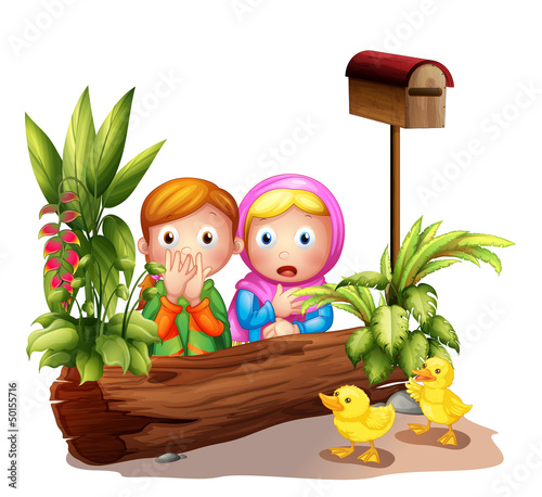 The two girls and the ducklings near the mailbox