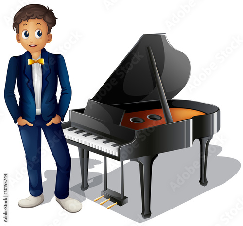 A boy beside the piano