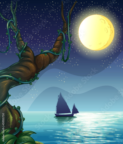 A boat sailing in the middle of the night