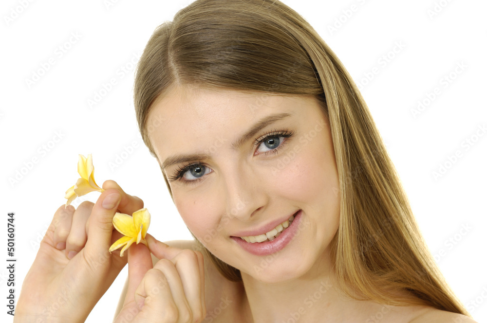 Beautiful girl with frangipani flower in her hand Beautiful girl with frangipani flower in her hand