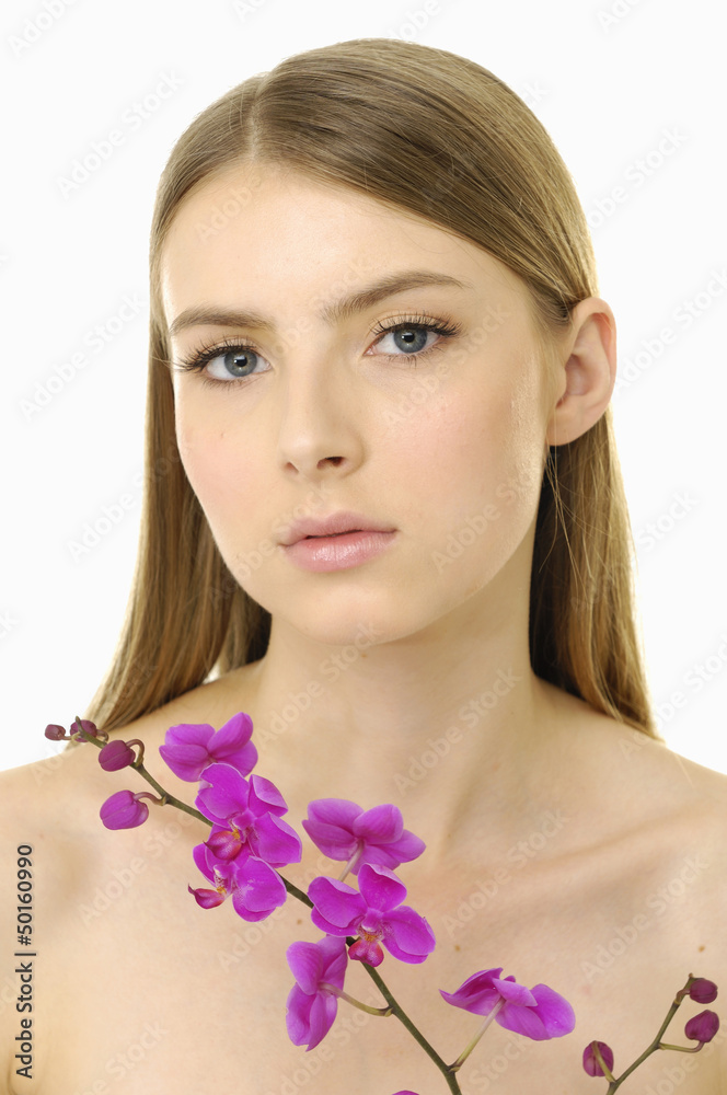 brunette woman beauty portrait with orchid