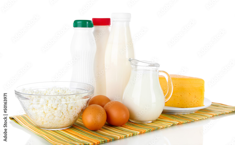 Dairy products and eggs on napkin isolated on white