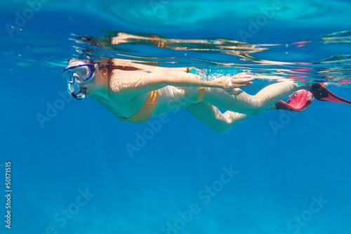 Young women at snorkeling in the Andaman sea