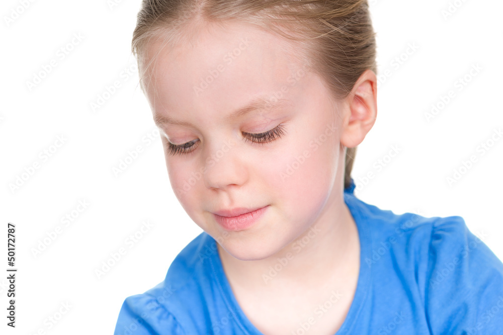 Close portrait of happy small girl looking down Close portrait of happy small girl looking down