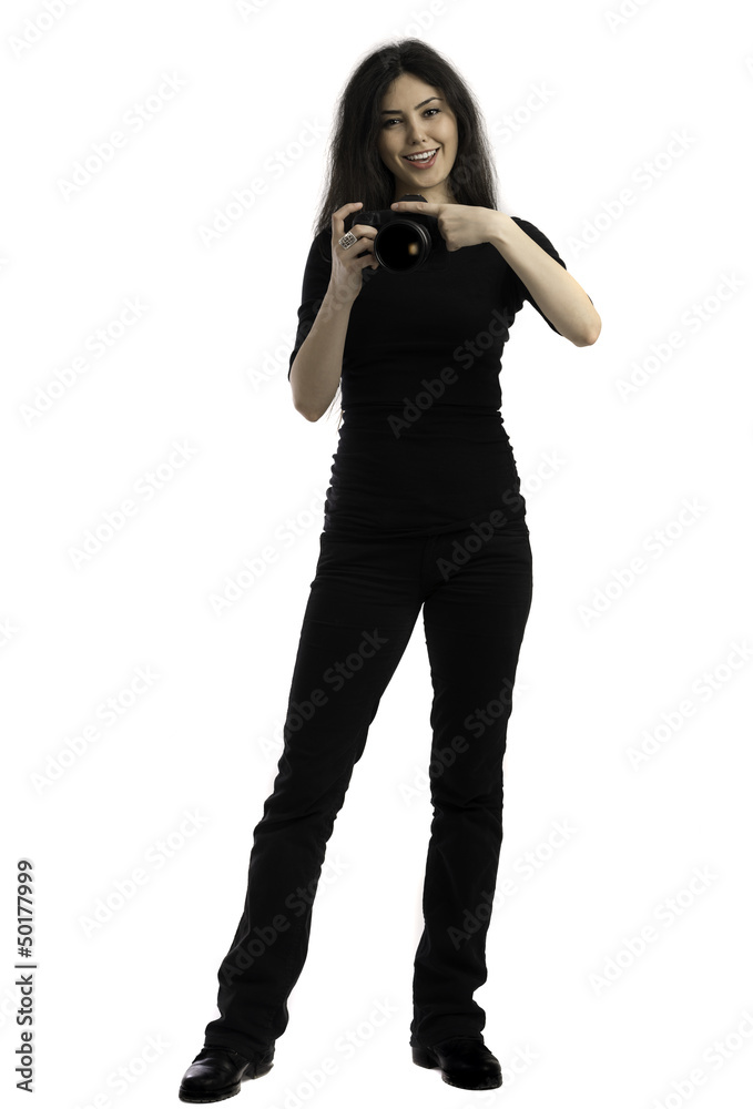 The beautiful girl with the camera, isolated on a white backgrou The beautiful girl with the camera, isolated on a white backgrou