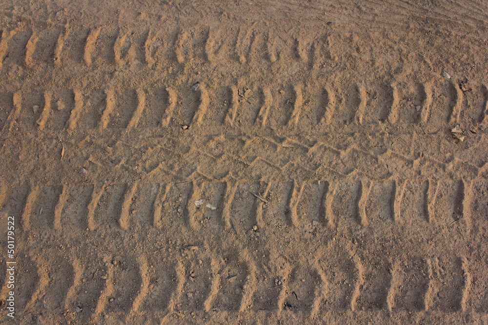Wheel tracks on country road