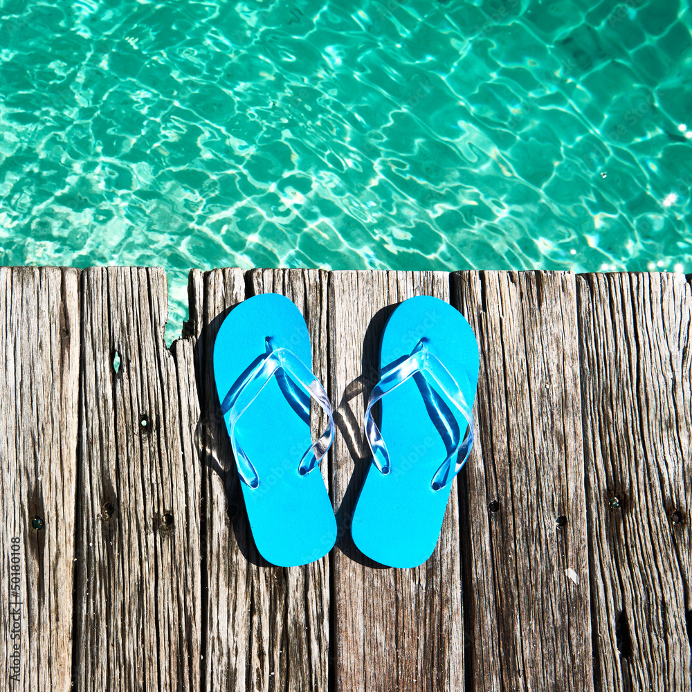 Naklejka premium Slippers at jetty