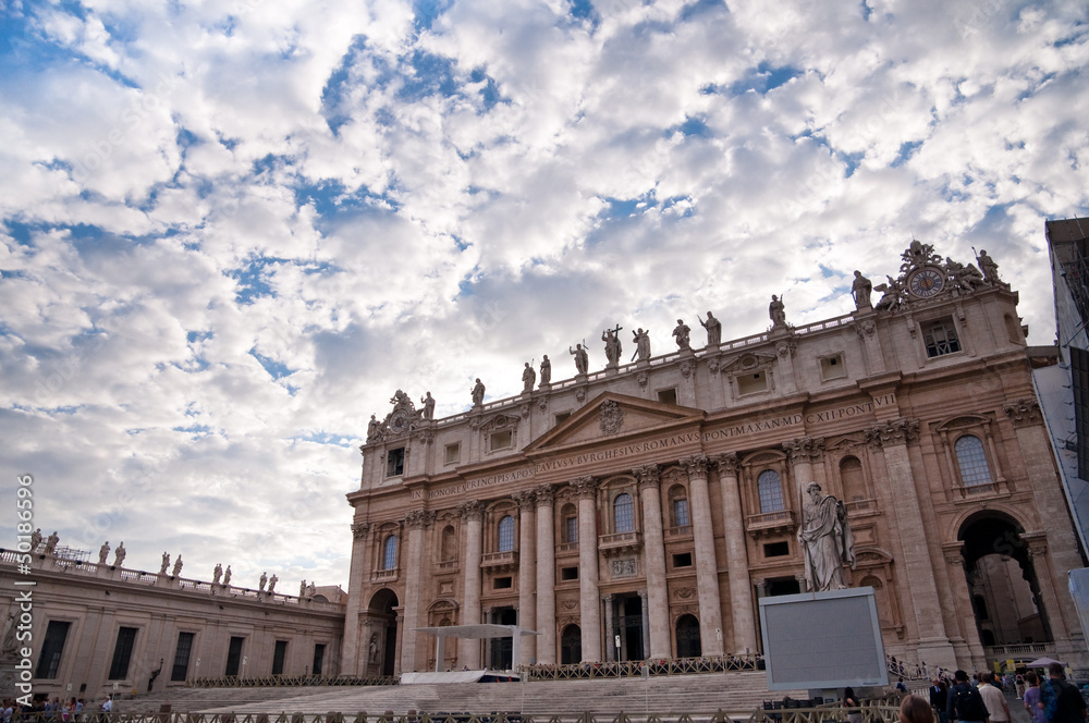 St Peter Basilica front fachade with cloudy sky at Vatican