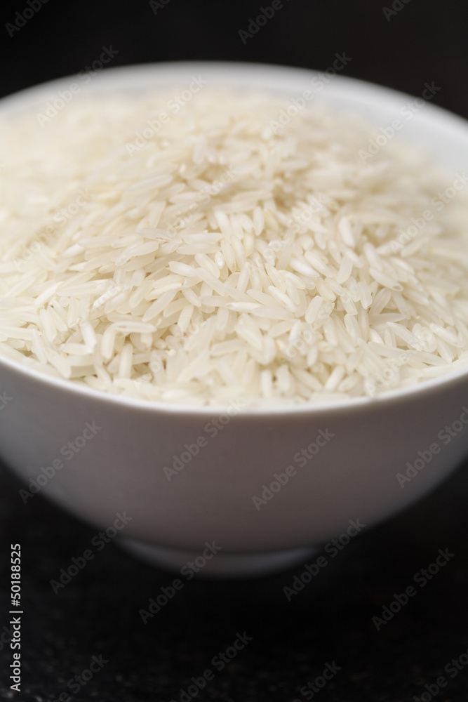 Uncooked rice in bowl