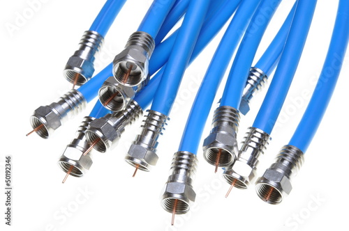 Bunch of blue coaxial cables with connectors photo