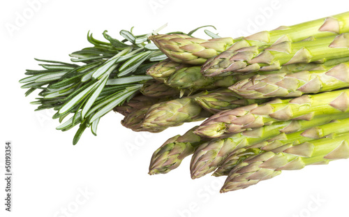 fresh asparagus spears with rosemary isolated on white