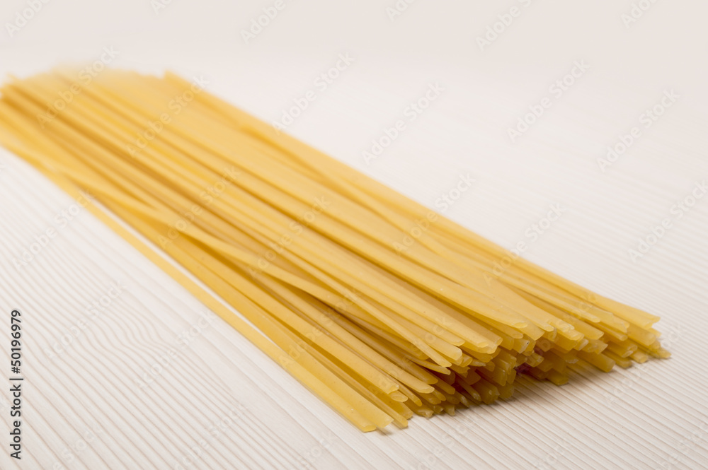 spaghetti on a table ready to cook spaghetti on a table ready to cook