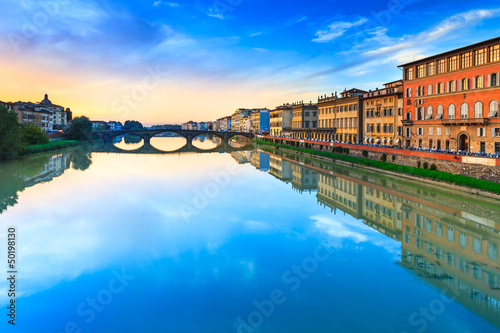 Florence, carraia medieval bridge on Arno river on sunset photo