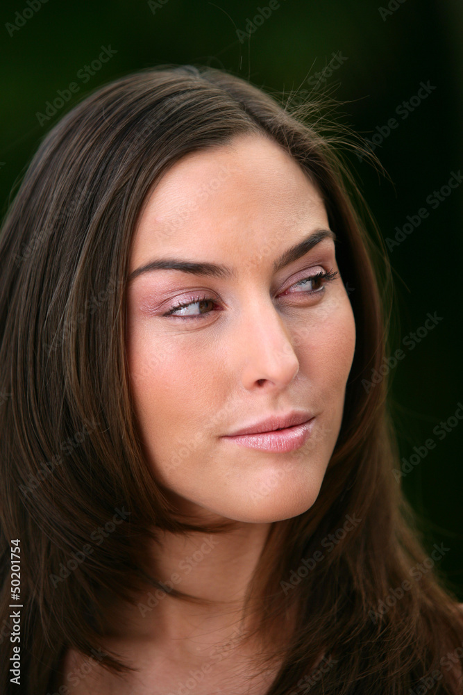 Head-shot of pensive brunette Head-shot of pensive brunette