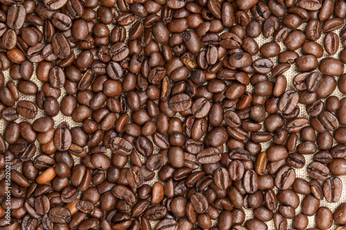 heap of coffee beans on burlap