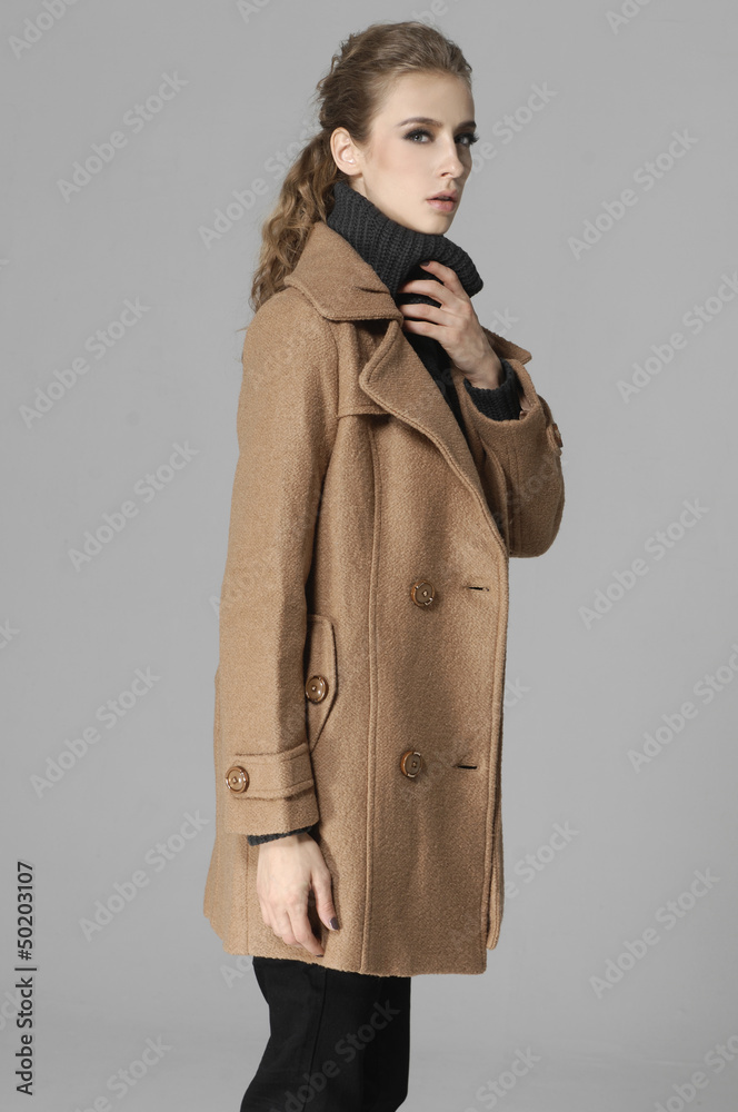 Side view of attractive friendly smiling girl Side view of attractive friendly smiling girl