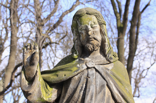 Historic Jesus on the old Prague Cemetery, Czech Republic