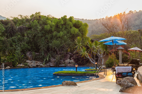 Outdoor Swimming Pool in sunset time