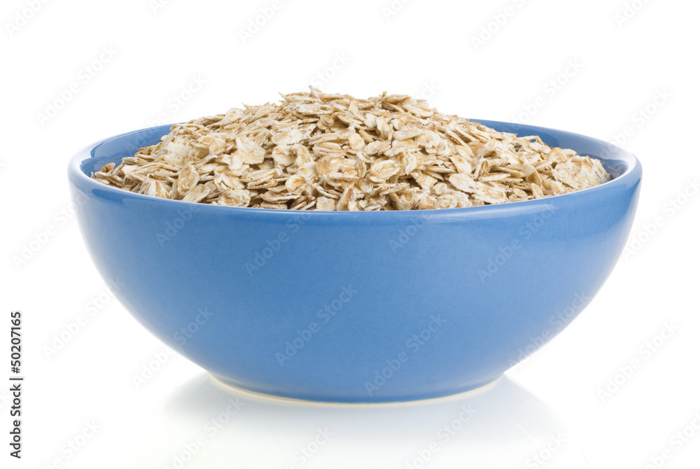 bowl of oat flake on white bowl of oat flake on white