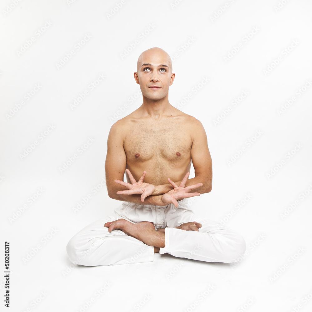 young man practicing yoga on white background, meditating young man practicing yoga on white background, meditating