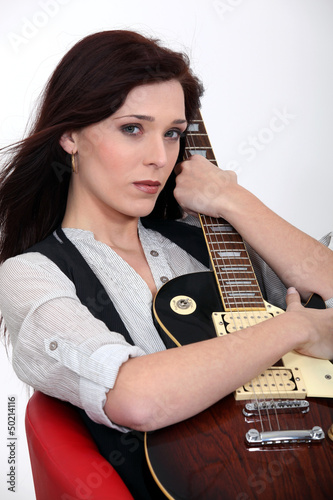 Woman with guitar photo