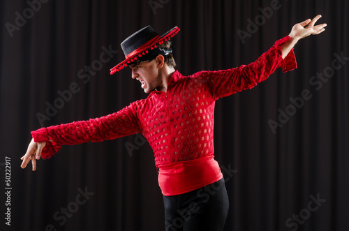 Man in studio dancing spanish dances