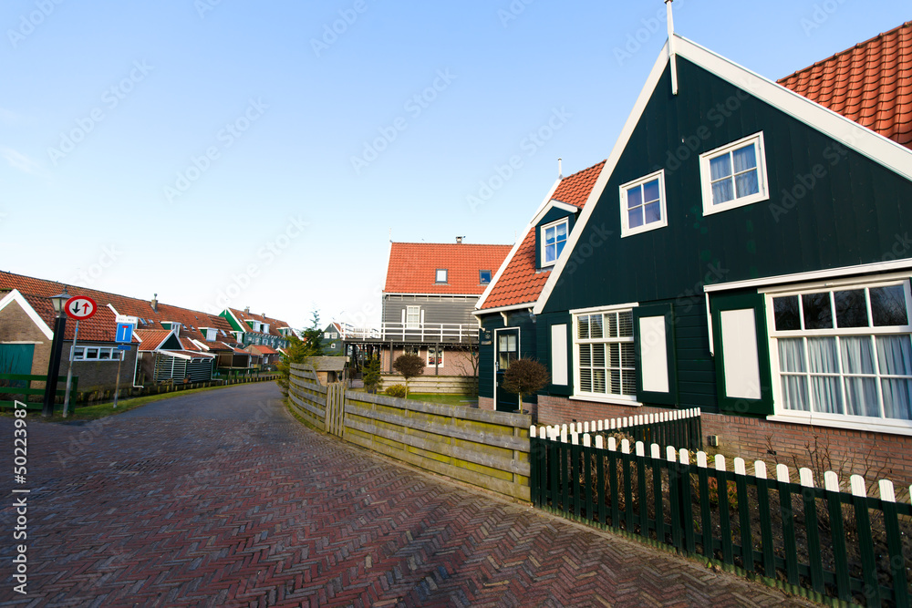 Typical Dutch houses with gardens in village Marken, Netherlands