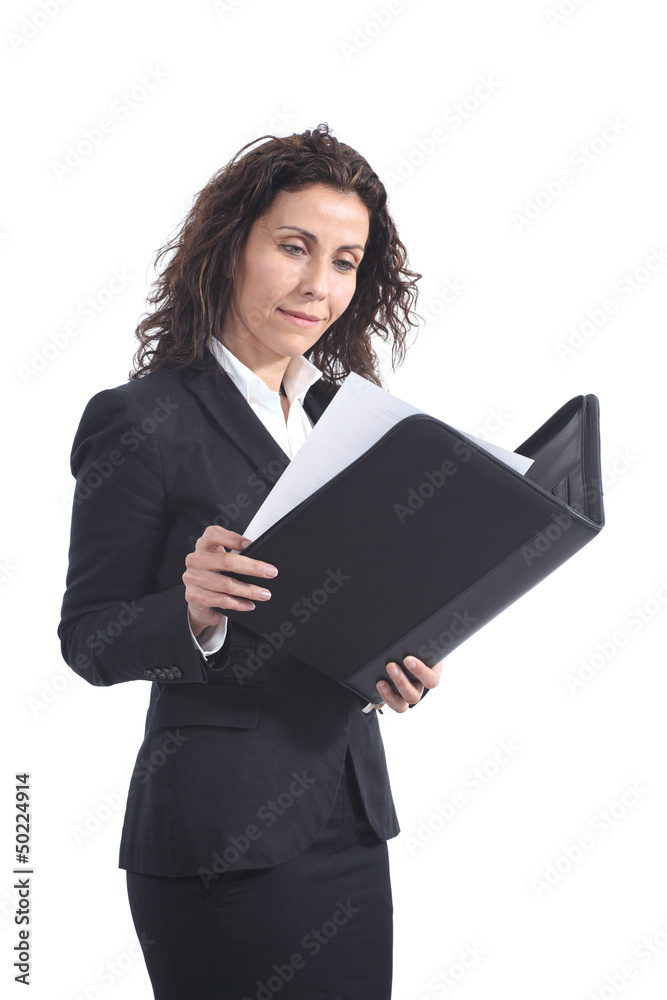 Beautiful mature businesswoman reading a report Beautiful mature businesswoman reading a report