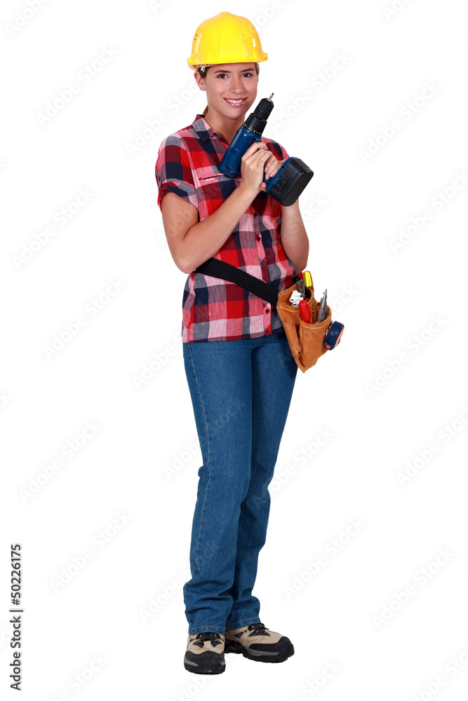 Female worker with a drill Female worker with a drill