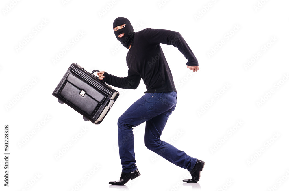 Industrial espionage concept with person in balaclava Industrial espionage concept with person in balaclava