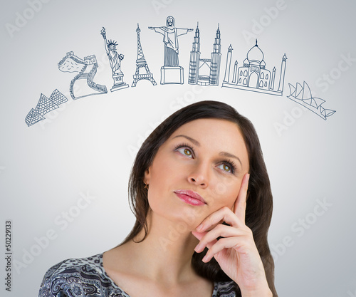 Young pretty woman dreaming about her vacation. Famous touristic photo
