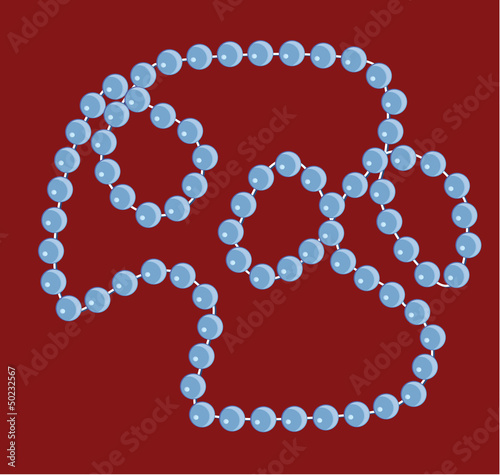 Beads necklace on a red background