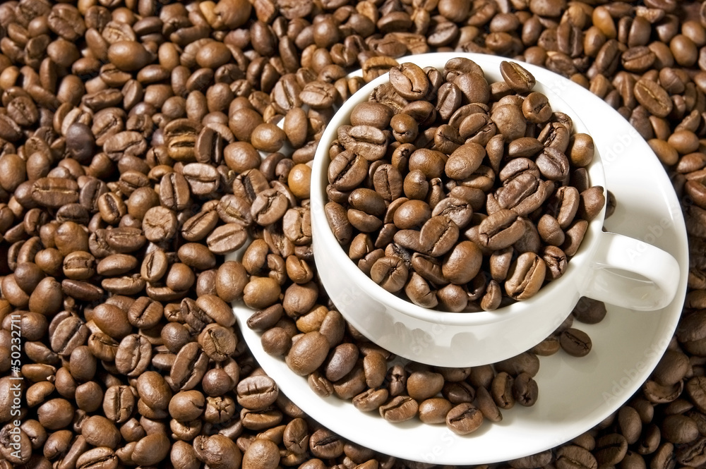 Cup with coffee beans