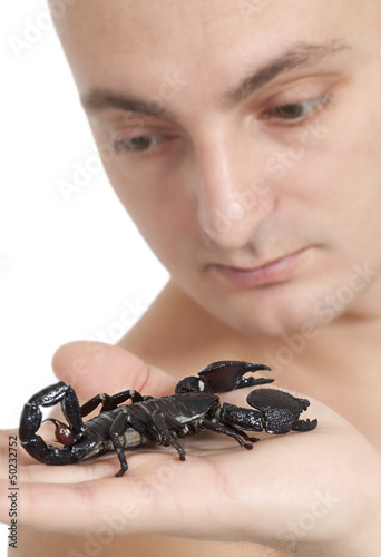 Man with scorpion on his palm