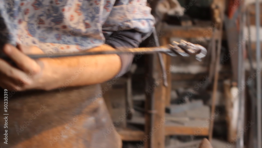 Blacksmith work. The blacksmith does arrow from metal. Blacksmith work. The blacksmith does arrow from metal.