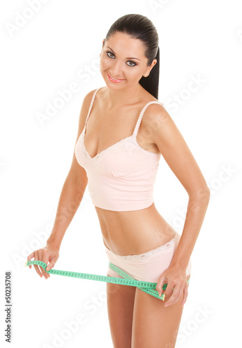 Happy woman with measure tape