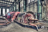 Old damaged machinery in derelict power plant